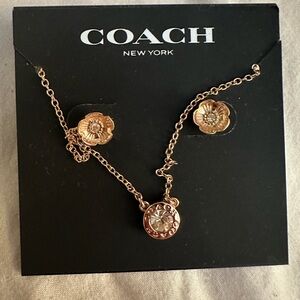 Coach Gold Necklace with Floral Pendant